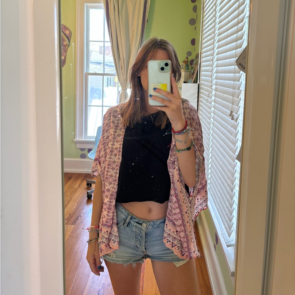 Cover up or something to go over your shirt. Bethany Mota. Medium. Pink/ purple